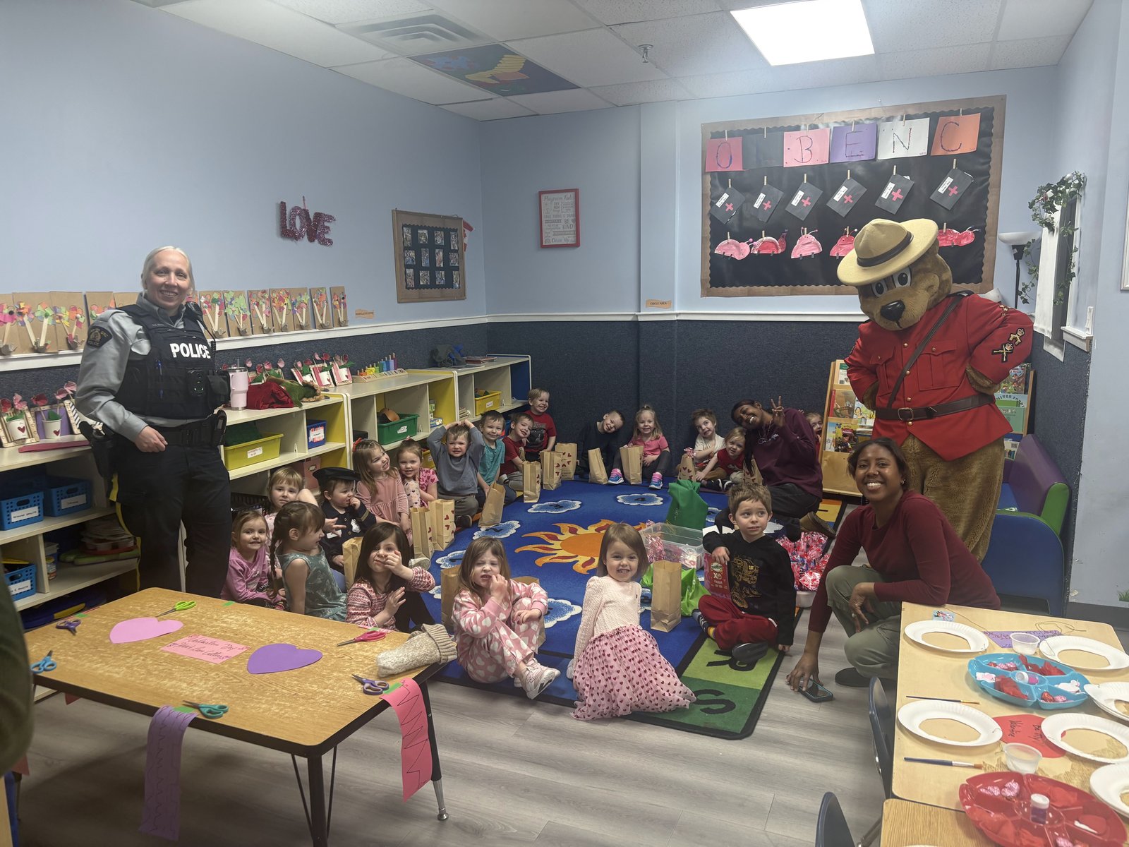 RCMP officer and Safety Bear visit for Valentine's Day